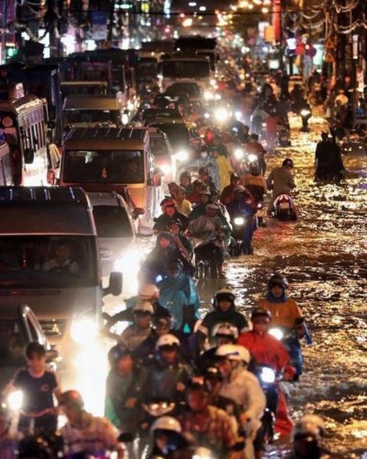 Rush hour in the submerged streets of the city.